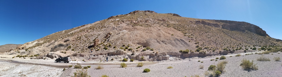 Figure 2: Extensive historical mining dumps at West Dome (looking West), Carangas Project